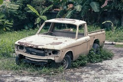 Abandoned Old Car In The Garden