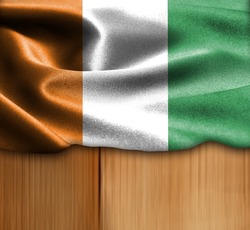 Cote d Ivoire flag on wood Texture