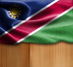 Namibia  flag on wood Texture