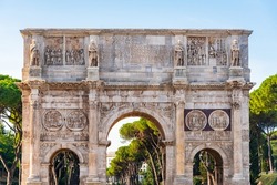 The Arch of Constantine a triumphal arch in Rome (Arco di Costantino) situated near the Colosseum and the Palatine Hill. Rome, Lazio, Italy - September 22, 2021