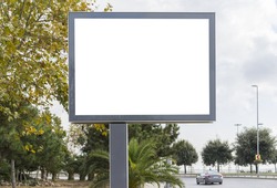 Blank white gaintboard advertising mockup in empty street