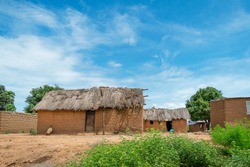 Traditional African house in the countryside, made of clay and straw.