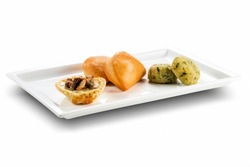 Rectangular plate with mini calzone, potato croquettes with tops, crispy pastry with porcini mushrooms isolated on white background