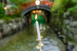 Mitarashi festival at
Shimogamo Shrine, people hold the candle walking on the river in the shrine for pray, Kyoto, Japan