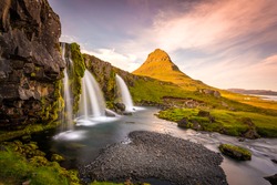 Kirkjufell Mountain, Iceland, Landscape with waterfalls, long exposure in a sunny day, Snaefellsnes peninsula