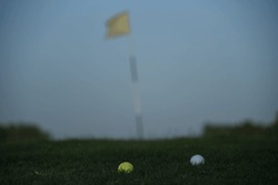 Gold course, golf balls, gold green and fairway, golfer, tee and driver