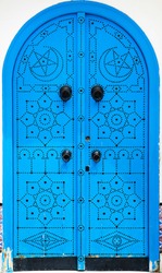 Traditional blue arched door from Sidi Bou Said in Tunisia. Large resolution