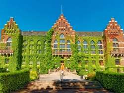 Facade of the university library in Lund Sweden The building of architecture overgrown with greenery