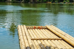 traditional raft made of bamboo in a lake