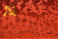 Flag of the Communist party, at the faded and  rusty background. Concept photo