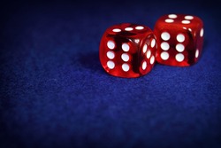 Red Casino Dice on blue background