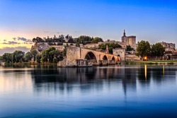Avignon Bridge with Popes Palace and Rhone river at sunrise, Pont Saint-Benezet, Provence, France 