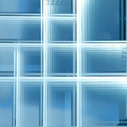 Double exposure of glazed windows. Abstract architecture of modern building. Closeup of glass panels and metal frames. Facade wall. Business real estate. Geometric pattern of parallel lines.