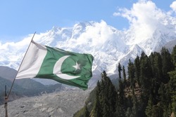 Pakistan Flag at Fairy Meadows Pakistan in front of the mighty Nanga Parbat