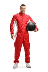 Full length portrait of a racer in a red uniform holding a helmet and smiling isolated on white background