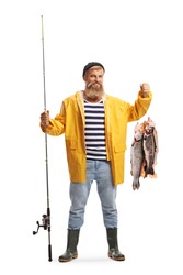 Full length portrait of a fisherman in a yellow rain coat holding a fishing pole and fish isolated on white background