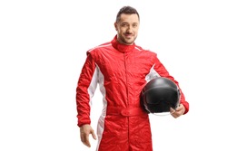 Man racer in a red uniform holding a helmet and smiling isolated on white background