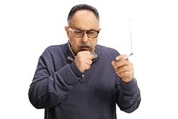 Mature man holding a cigarette and coughing isolated on white background