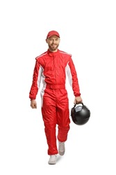Full length portrait of a racer holding a helmet and walking towards camera isolated on white background