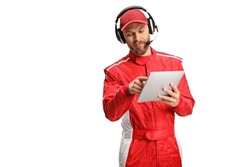Member of a racing team with headphones holding a digital tablet isolated on white background