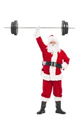 Full length portrait of Santa holding a heavy barbell in one hand isolated on white background