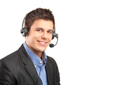 Portrait of a handsome customer service operator wearing a headset isolated on white background