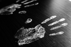 Imprint of human hands,black background