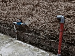 Water meter beside the house, Measuring tool, Open the cover of the water meter to check the number of the water usage counter, water pipe and meter with the house waterspout