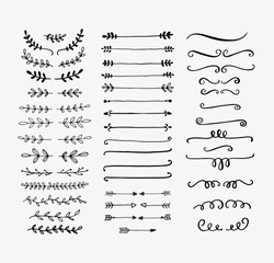 Hand drawn vector dividers. Lines, borders and laurels set. Doodle design elements.