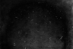 Grunge black scratched background, old film effect, distressed scary texture