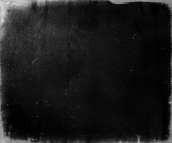 Black scratched grunge movie background, old film effect, scary distressed texture with frame