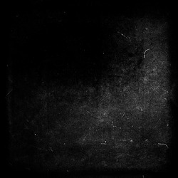 Black grunge scratched background, old film effect, distressed scary halloween texture
