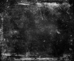Grunge abstract scratched dark textured background with  frame