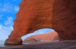 Famous Legzira Beach on Atlantic coast in Morocco, North Africa. One of two rock archways at Legzira beach on Morocco’s Atlantic coast has collapsed in 2016.
