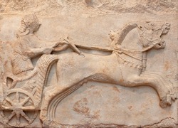 Ancient marble bas relief of a Charioteer - famous landmark of Archaic period, late 6th century BC, from Cyzicus (Erdek), Turkey