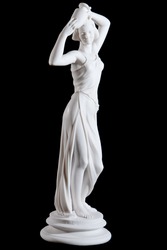 Classical white marble statue of a woman with vase isolated on black background