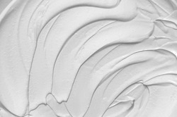 Cosmetic texture of clay. White mud mask for face and body. Abstract background