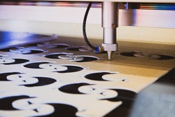 Acrylic sheet laser cutting machine.
