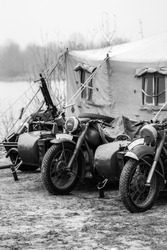 Old Wehrmacht equipment at a military tent. Black and white shot