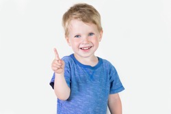 Portrait of cheerful kid boy showing how old he on fingers - isolated over white background