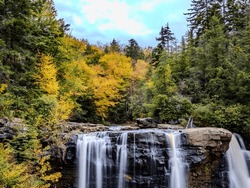 Mystic Blackwater Falls cradled in West Virginia's autumn charm.