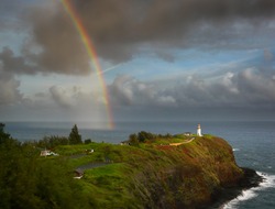 Pretty rainbow over Kilauea lighthouse at the North Shore of Kauai, Hawaii.