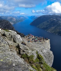 Pulpit rock cliff side in Norway and lots of tourists