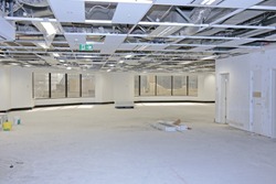 A floor being fitted out showing ceiling cavity
