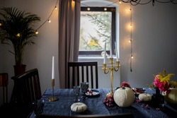 Halloween table with pumkin, cadlestick and other 