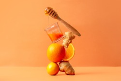 juice of honey, ginger, orange and lemon, symbol of balance