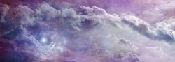Enchanting romantic Purple Pink Sky Scape Message Banner - wide cloudscape of a beautiful delicate fluffy trail of clouds  and copy space for messages
