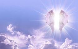 Guardian Angel Sky Message Banner - Beautiful sunny blue sky with a pair of glowing Angel Wings on one side and copy space for angelic messages
