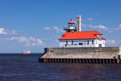 A Lighthouse On Lake Superior with A Ship
