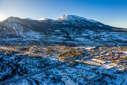 Aerial view winter wonderland sunset in Frisco Colorado